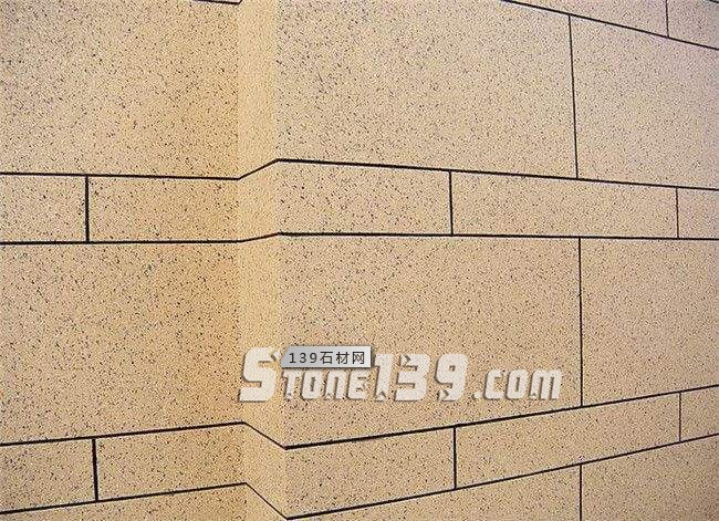 外墻裝飾選石材干掛還是真石漆？